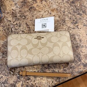 Coach Signature Beige Wristlet